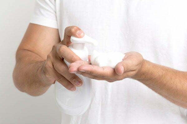 close-up-man-hand-spraying-shaving-foam close-up-man-hand-spraying-shaving-foam