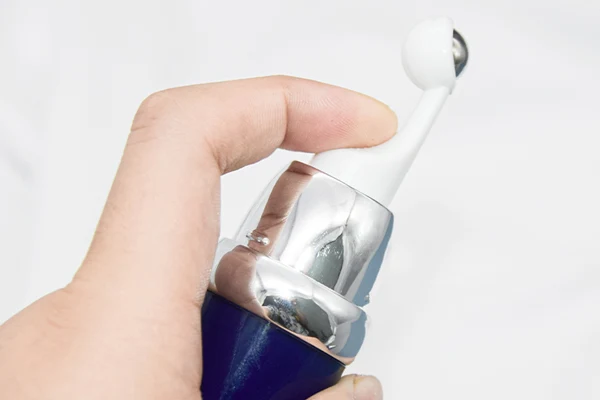 easy to press massage head of eye cream blue bottle easy to press massage head of eye cream blue bottle