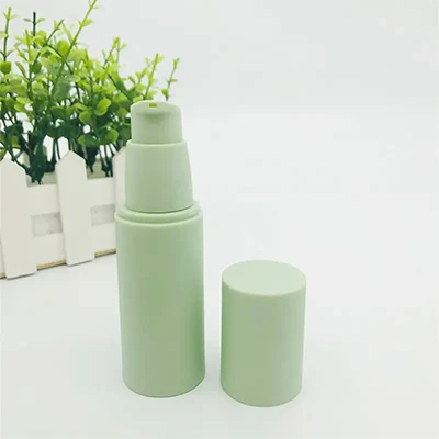 green cosmetic bottles