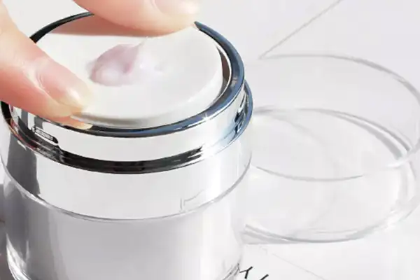 press the airless pump jar to get the cream