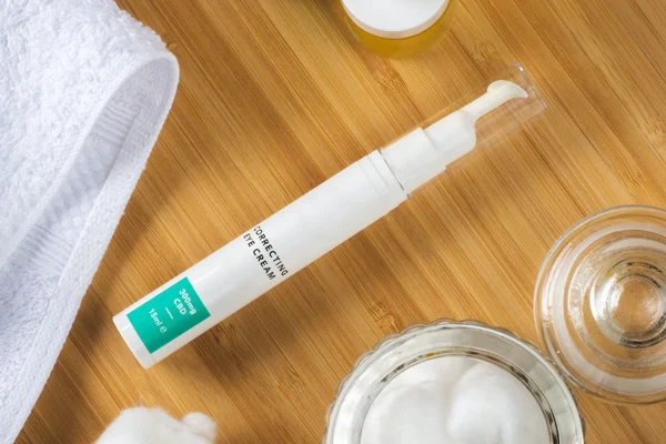 white plastic eye cream bottle with massage head white plastic eye cream bottle with massage head