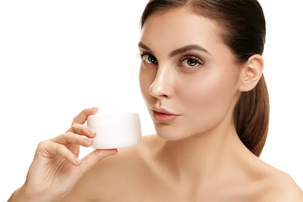 woman applying moisturizer eye cream woman applying moisturizer eye cream